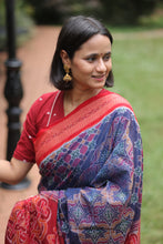 Load image into Gallery viewer, Elegant Sambalpuri cotton saree in shaded blue with multicolor body motifs and a red rudraksh border