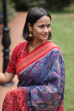Load image into Gallery viewer, Elegant Sambalpuri cotton saree in shaded blue with multicolor body motifs and a red rudraksh border