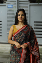Load image into Gallery viewer, Mercerized Cotton Sambalpuri Saree in Black & Rust with Musical Ikat Motifs – Pasapali