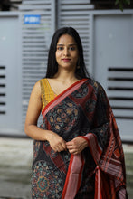 Load image into Gallery viewer, Rāgini – Black & Rust Mercerized Cotton Sambalpuri Saree with Musical Ikat Motifs