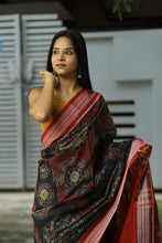 Load image into Gallery viewer, Rāgini – Black & Rust Mercerized Cotton Sambalpuri Saree with Musical Ikat Motifs