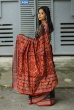 Load image into Gallery viewer, Rāgini – Black & Rust Mercerized Cotton Sambalpuri Saree with Musical Ikat Motifs