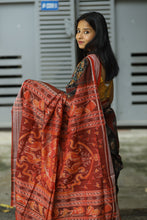 Load image into Gallery viewer, Rāgini – Black & Rust Mercerized Cotton Sambalpuri Saree with Musical Ikat Motifs