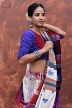 Load image into Gallery viewer, Adrika Kotpad natural dye cotton saree folded — off-white, red-blue tribal motifs, Pasapali handloom