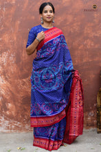 Load image into Gallery viewer, Charulata Blue Sambalpuri cotton saree by Pasapali — front drape showing lotus and peacock body motifs.