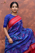 Load image into Gallery viewer, Charulata Blue Sambalpuri Handloom saree by Pasapali — folded view showing Rudraksha border and Jhoti pallu.
