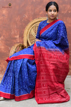 Load image into Gallery viewer, Devyani Blue Sambalpuri Bandha mercerized cotton saree by Pasapali — full hero view with red border and ikat pallu