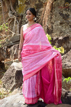Load image into Gallery viewer, Handloom drape view of Harini — authentic Sambalpuri Handloom Bandha saree in light pink by Pasapali.