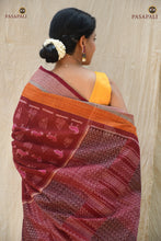 Load image into Gallery viewer, Harini maroon Sambalpuri Bandha saree folded view — Rudraksha border and ikat pallu visible