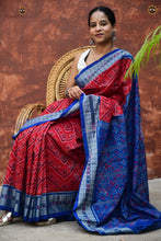 Load image into Gallery viewer, Kusumita Bandha saree Odisha — pallu detail with flower motifs woven by Bhulia weavers in Bandhakala process