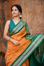 Load image into Gallery viewer, Mangala Jyoti yellow-green Sambalpuri cotton saree front drape — Diya motif body and fish motif border visible | Pasapali