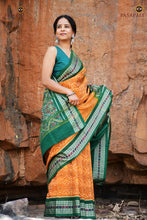 Load image into Gallery viewer, Close-up of fish motif border on Mangala Jyoti Sambalpuri Bandha mercerized cotton saree in yellow-green | Pasapali