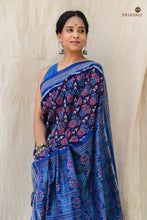Load image into Gallery viewer, Body weave detail of Neelima showing traditional phula motif in double ikat Bandhakala technique on navy cotton