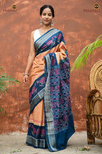 Load image into Gallery viewer, Padmavati Sambalpuri cotton saree folded detail — teal blue and cream ikat Bandha weave with Rudraksha and lotus motifs, Pasapali