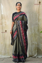 Load image into Gallery viewer, Handloom drape view of Pasarekha Grey Sambalpuri Bandha saree with flower pallu and Pasapali motif border — Pasapali