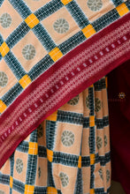 Load image into Gallery viewer, Pashika Sambalpuri Bandha saree drape front detail — GI certified handloom Sambalpuri saree in cream mercerized cotton by Pasapali