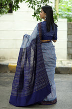 Load image into Gallery viewer, Elegant blue-bordered Sambalpuri saree made of pure cotton with intricate ikat weaving