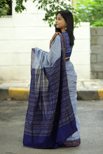 Load image into Gallery viewer, Authentic Sambalpuri cotton saree with sky blue base and delicate ikat buta motif design