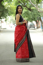 Load image into Gallery viewer, Pasapali red Sambalpuri saree featuring intricate Laxmi Yantra patterns symbolizing prosperity