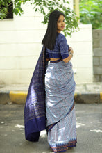 Load image into Gallery viewer, Blue ikat pallu on sky blue Sambalpuri cotton saree showcasing fine Odisha handloom craft