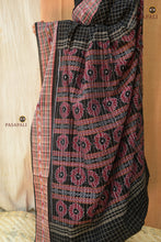 Load image into Gallery viewer, Purvasha Sambalpuri cotton saree flat lay — full black Bandha weave with pallu, border, and body, Pasapali