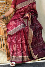 Load image into Gallery viewer, Front drape of Ramā maroon Sambalpuri Bandha saree by Pasapali showing Lakshmi Paado and jhoti body weave in mercerized cotton