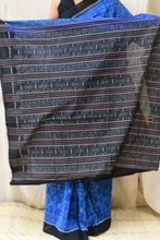 Load image into Gallery viewer, Body weave detail of Shankhamayi Sambalpuri Bandha saree showing shankha motifs and fish motifs at the bottom hem