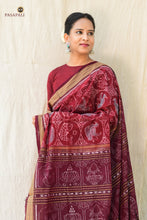 Load image into Gallery viewer, Folded Shri maroon Sambalpuri handloom cotton saree showing Bandha ikat pattern — Pasapali