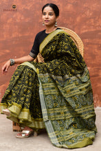Load image into Gallery viewer, Close-up of Rudraksha border motif on Suryalata Black Sambalpuri Bandha saree by Pasapali, Odisha handloom