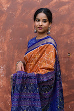 Load image into Gallery viewer, Tambuli Sambalpuri handloom saree folded view — light brown and blue Bandha ikat, 5.40 metres, Pasapali