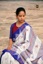 Load image into Gallery viewer, Close-up of coarse handspun cotton fabric on a white Kotpad saree with blue checks.