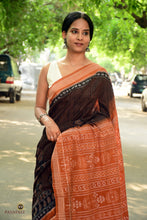 Load image into Gallery viewer, Body weave detail of Black Sambalpuri Bandha saree — brown stripes and leaf motif on black mercerized cotton, handloom woven in Odisha by Pasapali.
