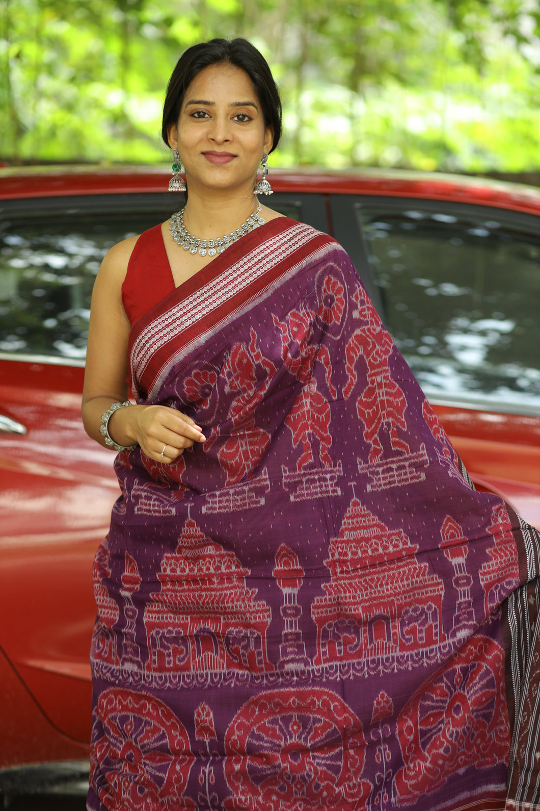 Purple Sambalpuri cotton saree with Konark motifs and maroon Rudraksh border, handwoven in Ikat style