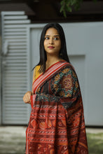 Load image into Gallery viewer, Rāgini – Black &amp; Rust Mercerized Cotton Sambalpuri Saree with Musical Ikat Motifs
