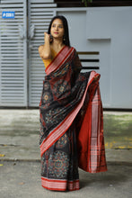 Load image into Gallery viewer, Rāgini – Black &amp; Rust Mercerized Cotton Sambalpuri Saree with Musical Ikat Motifs
