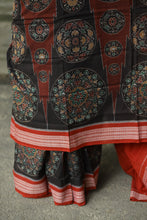 Load image into Gallery viewer, Rāgini – Black &amp; Rust Mercerized Cotton Sambalpuri Saree with Musical Ikat Motifs

