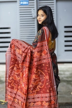 Load image into Gallery viewer, Rāgini – Black &amp; Rust Mercerized Cotton Sambalpuri Saree with Musical Ikat Motifs
