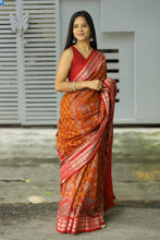 Load image into Gallery viewer, Light brown Sambalpuri cotton saree with elephant, lion, and fish Ikat motifs in the border – Pasapali
