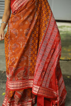Load image into Gallery viewer, Sambalpuri saree in light brown cotton with animal-inspired Ikat motifs and fish-bordered design
