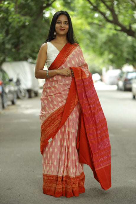 Orange-white Sambalpuri cotton saree with handwoven leaf motifs and red Ikat border – Pasapali