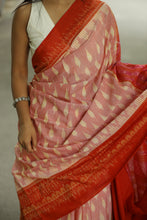 Load image into Gallery viewer, Close-up of leaf motif weaving on artisan-crafted orange-white Sambalpuri handloom saree
