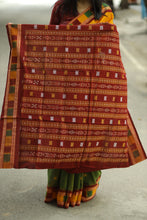 Load image into Gallery viewer, Dual-tone handloom Sambalpuri saree with yellow-mehendi combination and traditional ikat border
