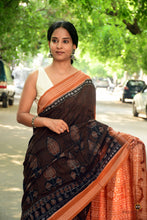 Load image into Gallery viewer, Close-up of Rudraksha motif border on Black Sambalpuri Bandha saree — handwoven by Bhulia weavers, Odisha, using Bandhakala double ikat technique.

