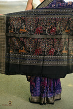 Load image into Gallery viewer, Black pallu close-up — elephant, tree, birds, deer motifs in Sambalpuri double ikat, Night Blue saree woven by Pasapali Bhulia weavers.
