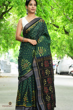 Load image into Gallery viewer, Pallu close-up of deep green Sambalpuri saree with multicoloured traditional ikat flower motif, woven by Bhulia weavers.
