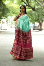 Load image into Gallery viewer, Green silk Sambalpuri saree with tissue work, temple motifs, and vibrant purple-pink pallu – Pasapali
