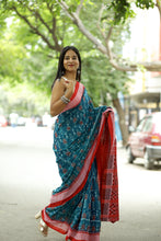 Load image into Gallery viewer, Mercerized cotton Sambalpuri saree in teal with tribal Ikat motifs and red check border – Pasapali

