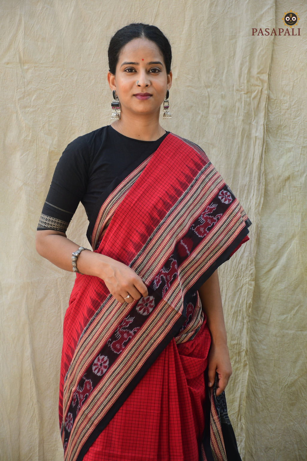 Close-up of Sachipar ikat weave — Deep Red Sambalpuri mercerized cotton handwoven saree — Pasapali