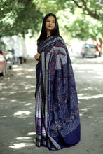 Load image into Gallery viewer, Traditional Sambalpuri Bandha saree in blue with floral body design and check Ikat border – Pasapali

