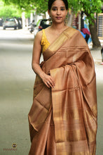 Load image into Gallery viewer, Close-up of chevron-like golden tissue zari border on light brown Sambalpuri tussar silk saree handwoven by Bhulia weavers, Odisha
